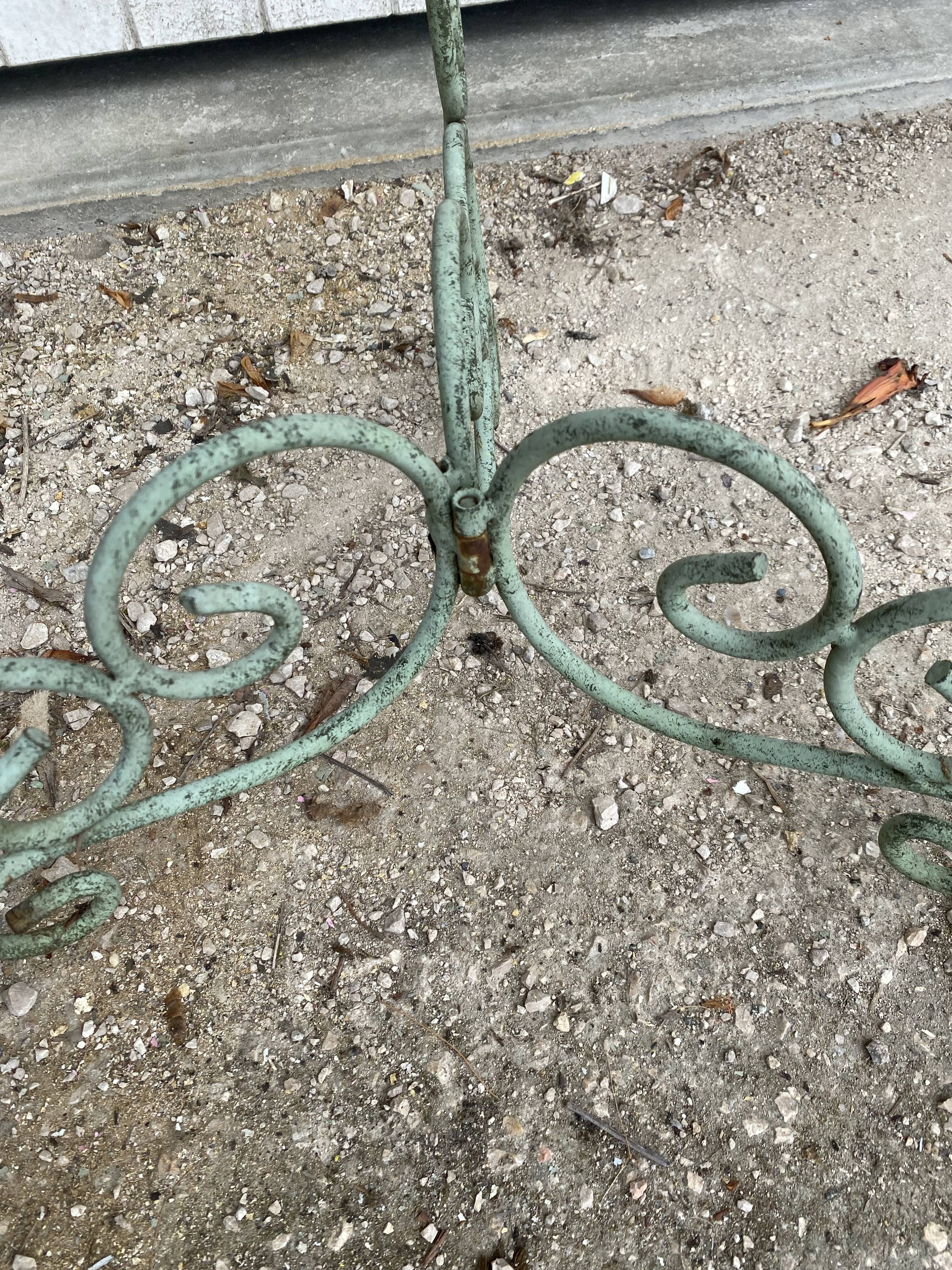Pedestal cans wrought iron plants