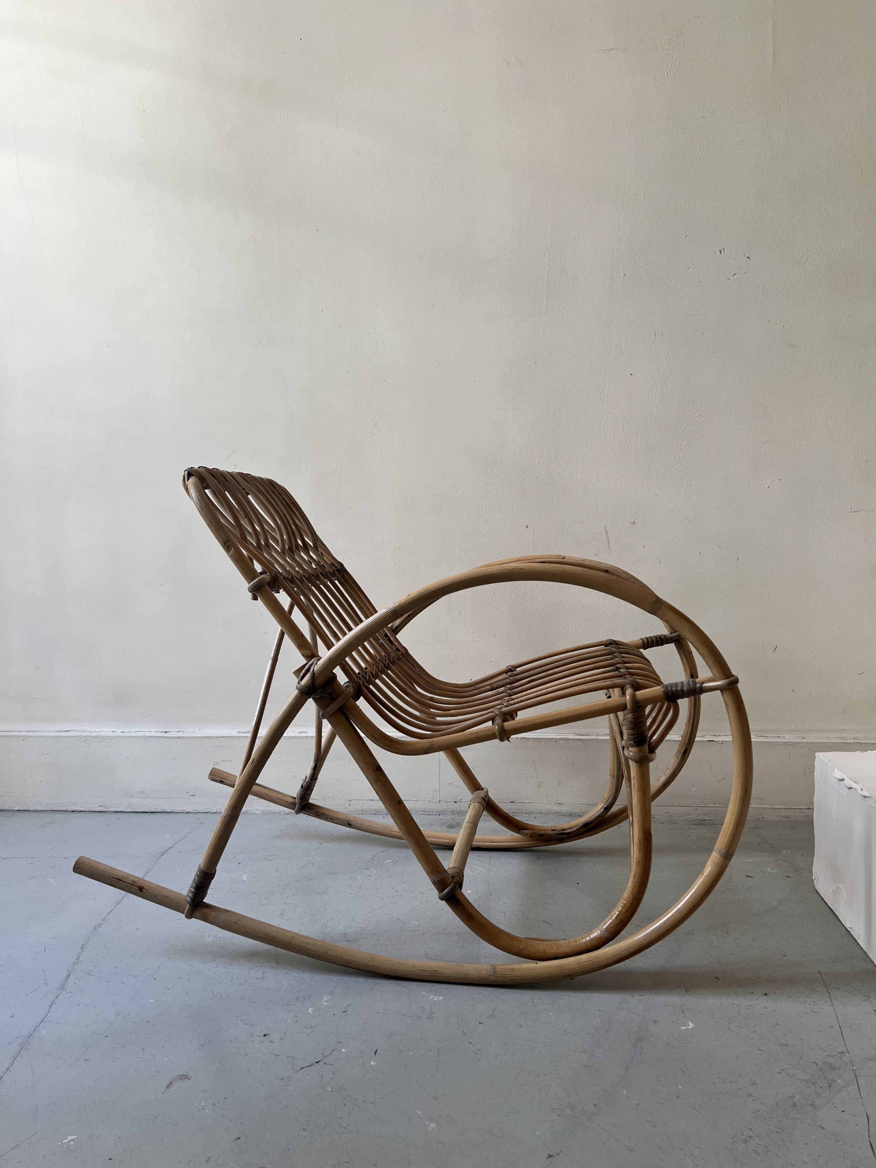 Child's rocking chair in rattan/bamboo, France 1950.