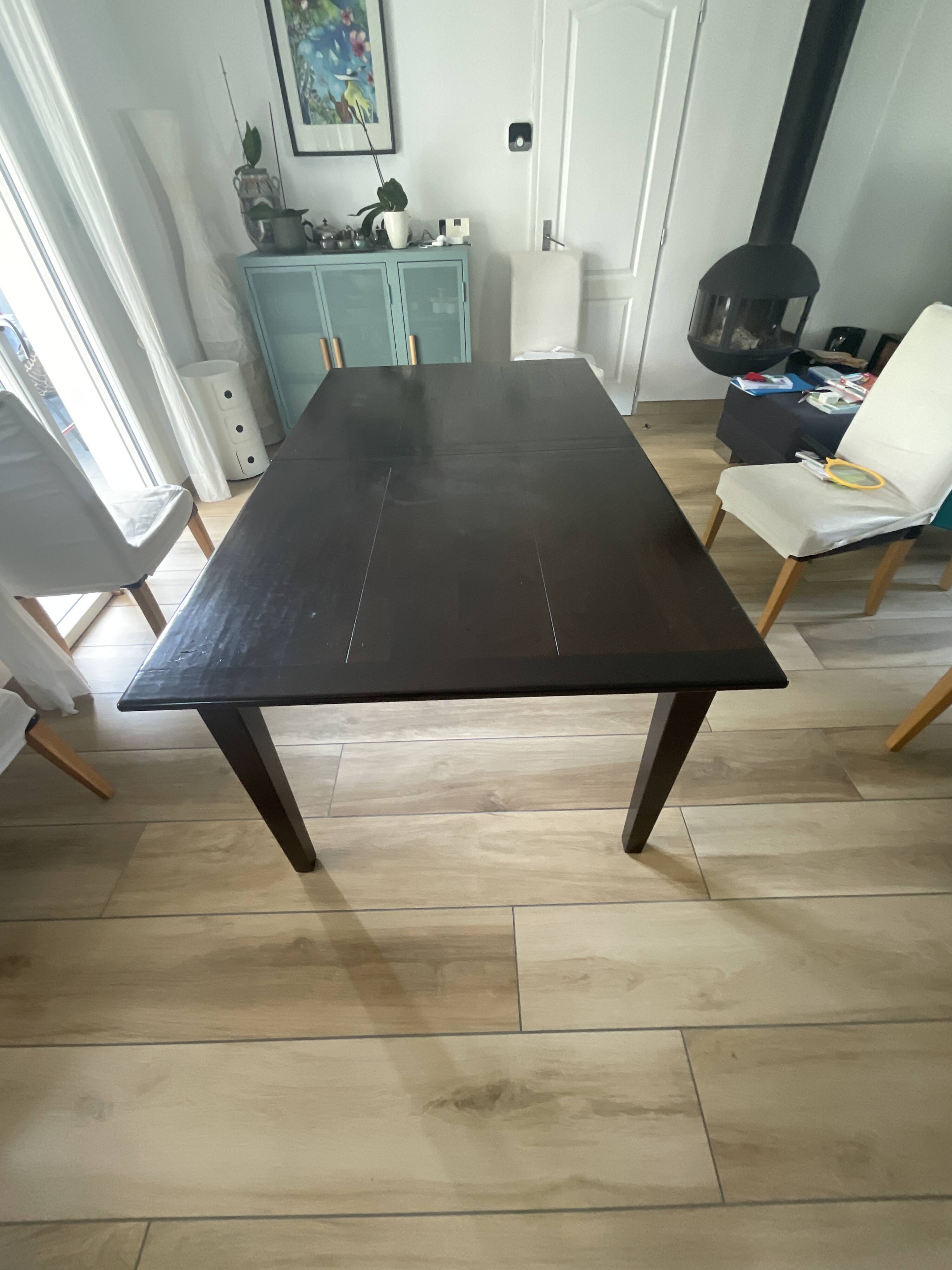 Solid cherry wood dining table, extendable for 8 to 12 people.