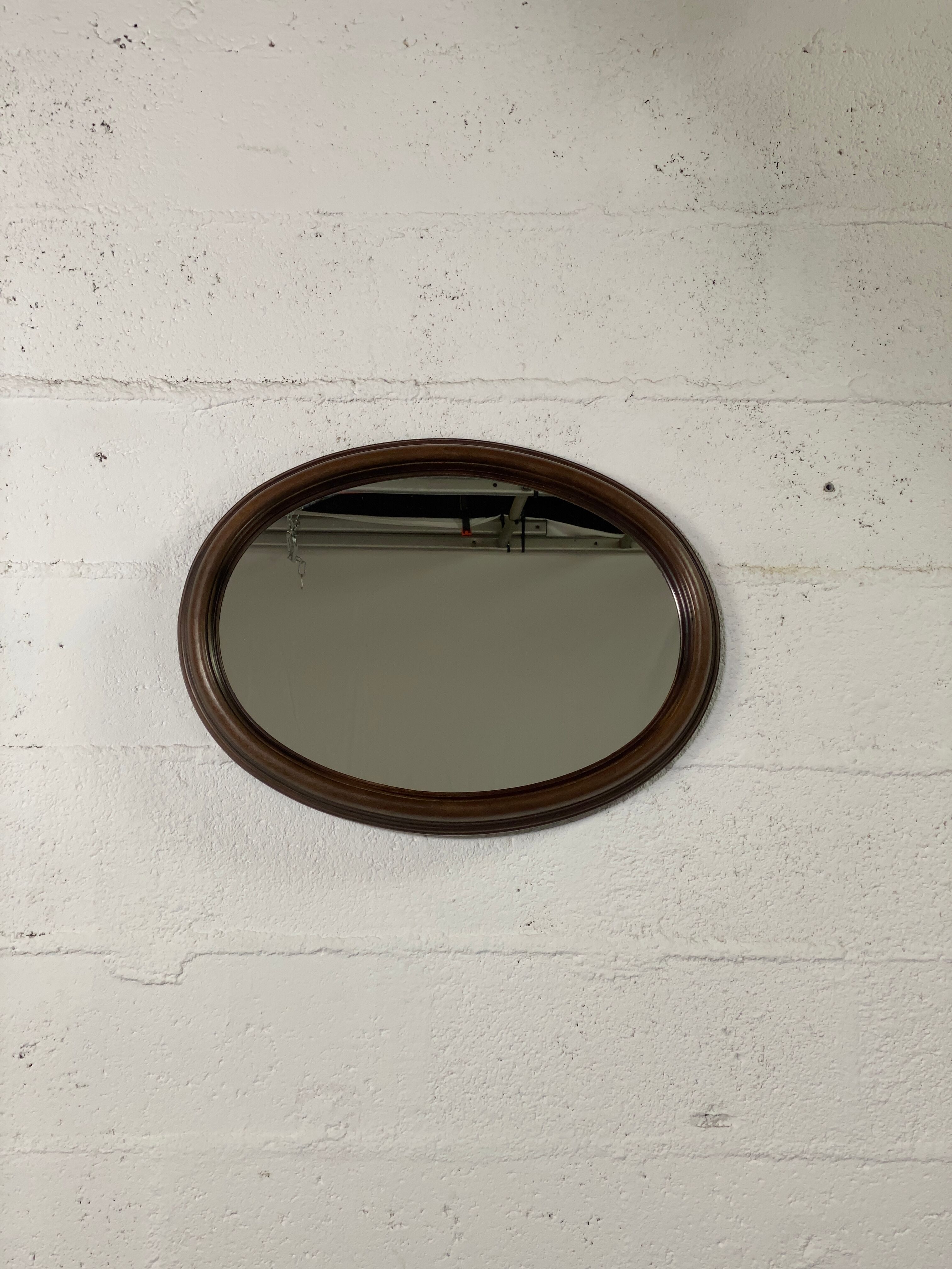 Oval wooden mirror