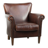 Fauteuil en peau de mouton confortable avec du caractère et une bonne dose d'élégance.