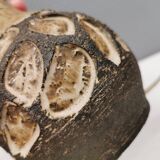 Small beautiful ceramic table lamp in earth colors.