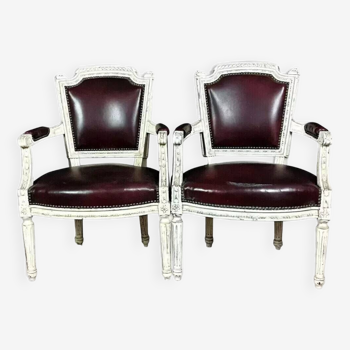 Pair of Louis XVI convertible armchairs in lacquered wood and leather circa 1850