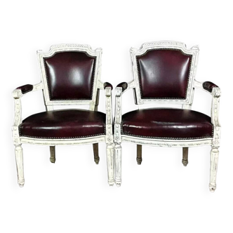 Pair of Louis XVI convertible armchairs in lacquered wood and leather circa 1850