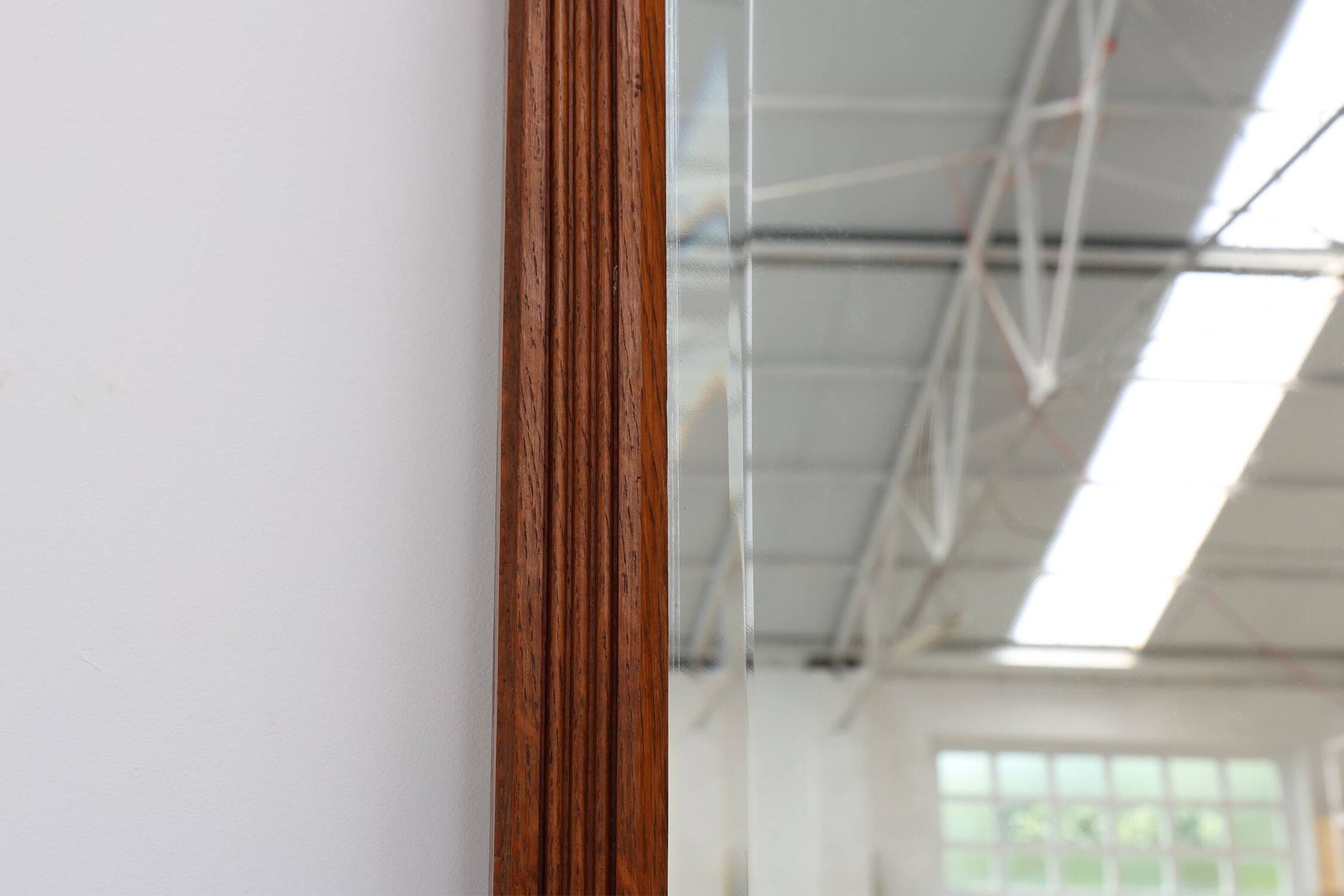French art deco mirror with carved oak wooden frame, ca. 1930