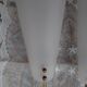 Pair of brass plastic sconces
