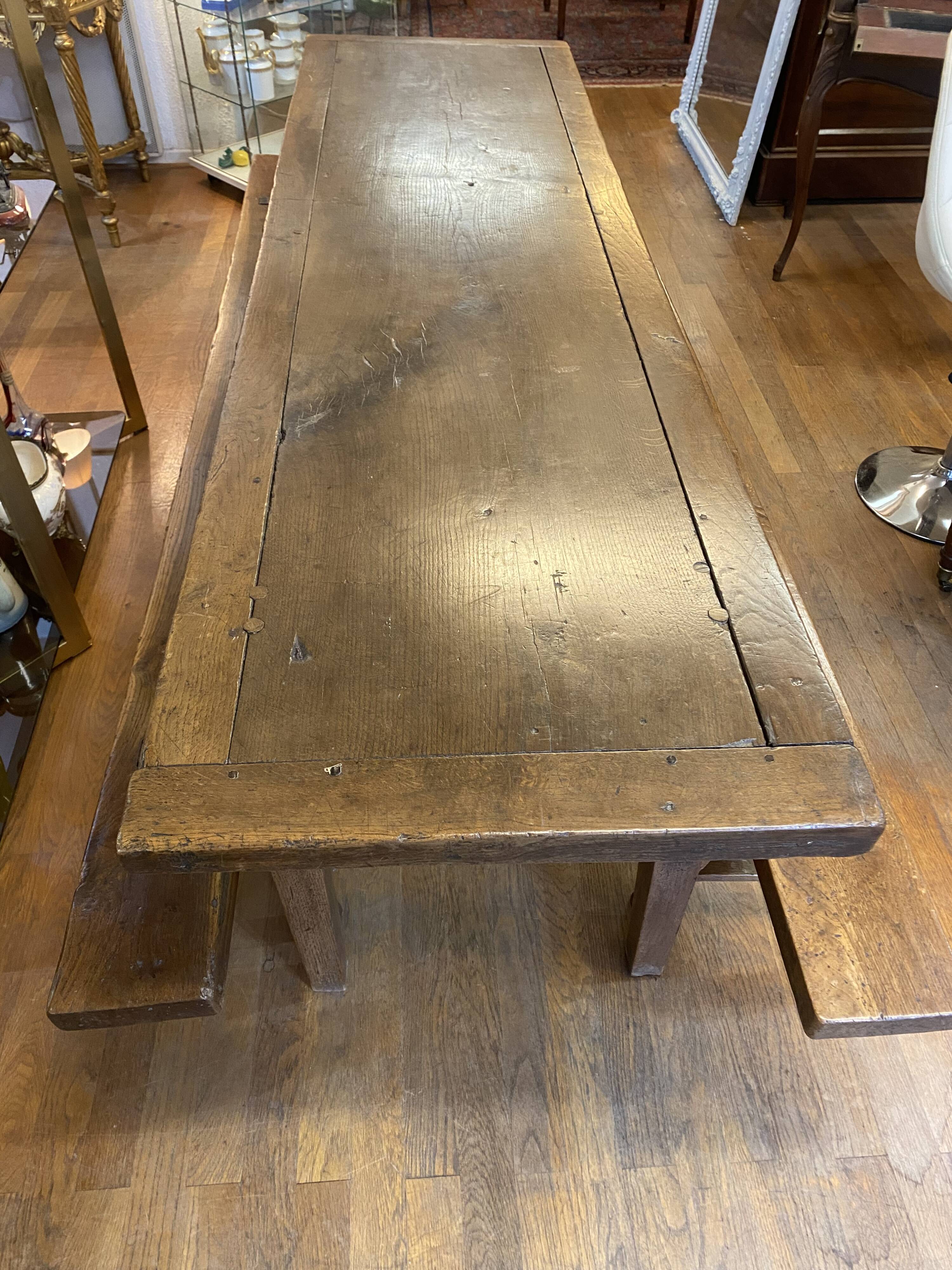 Farm table with its 2 benches.