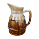 Former wine pitcher in glazed earth style bistrot auberge