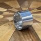 Silver metal napkin ring with the letter J