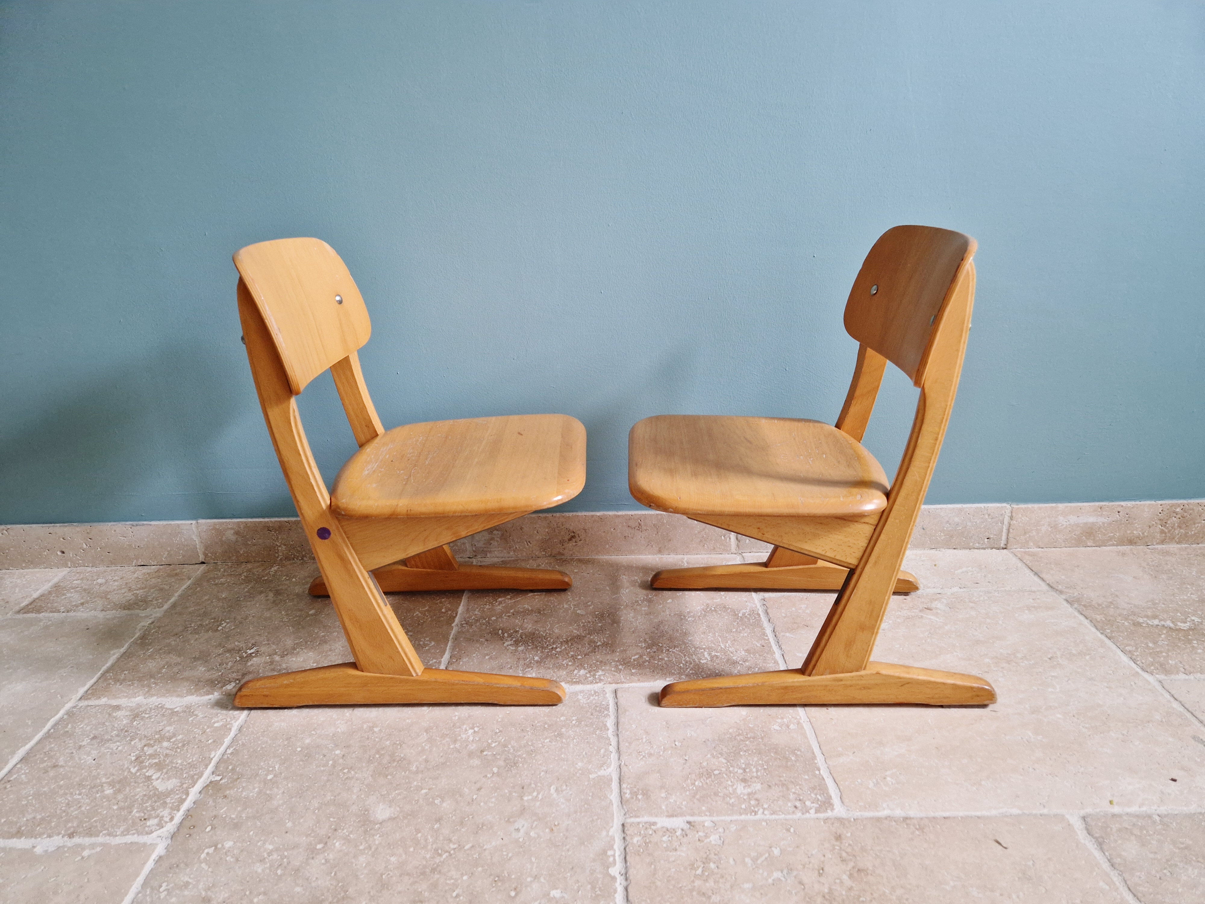 Pair of children's chairs by Casala in solid beech, 1960s.