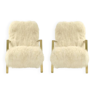 Paire de fauteuils contemporains modernes en chèvre mongole blanche d'Italie.