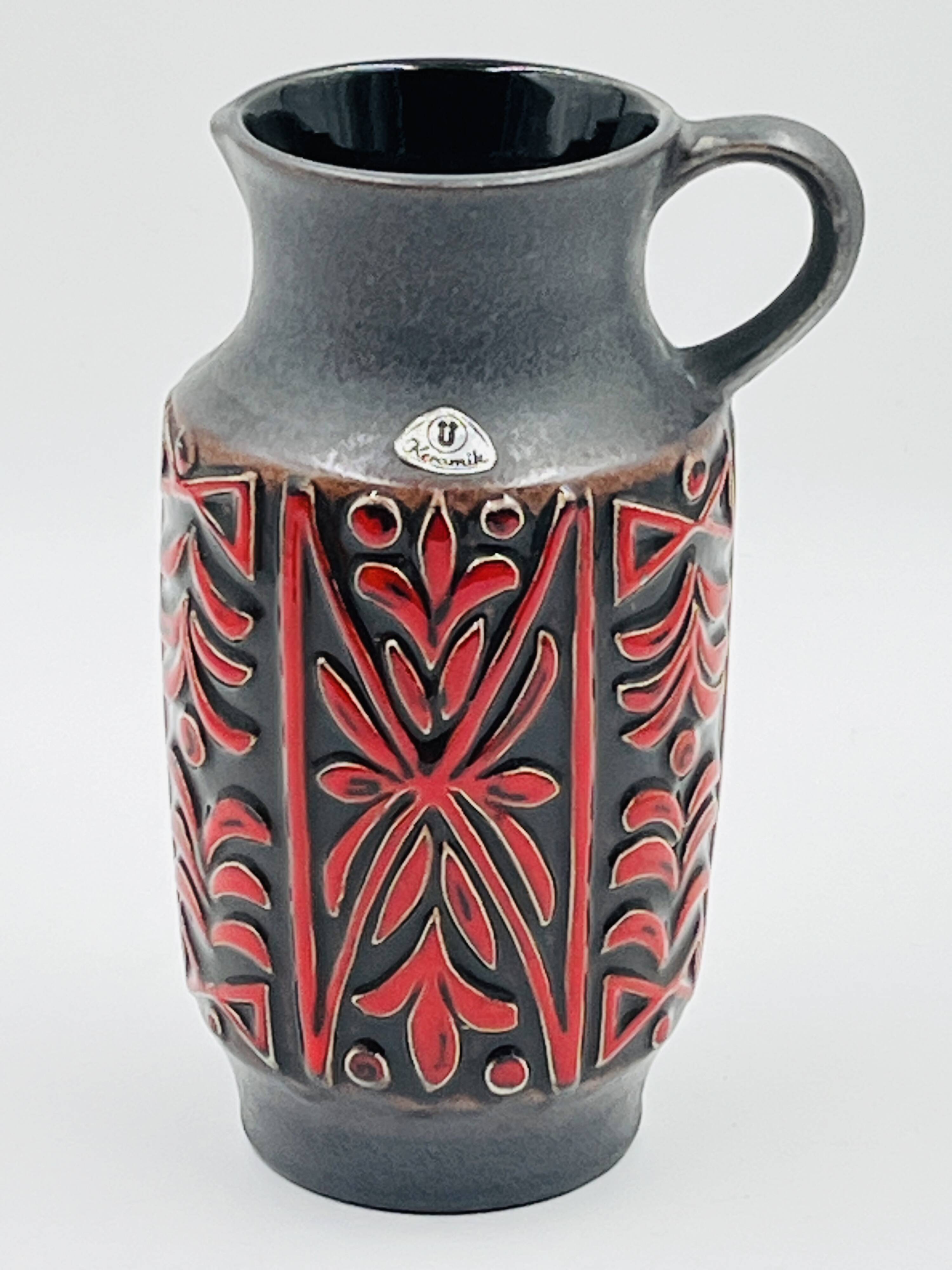 Vase West Germany, ceramic relief, red, 1970s.