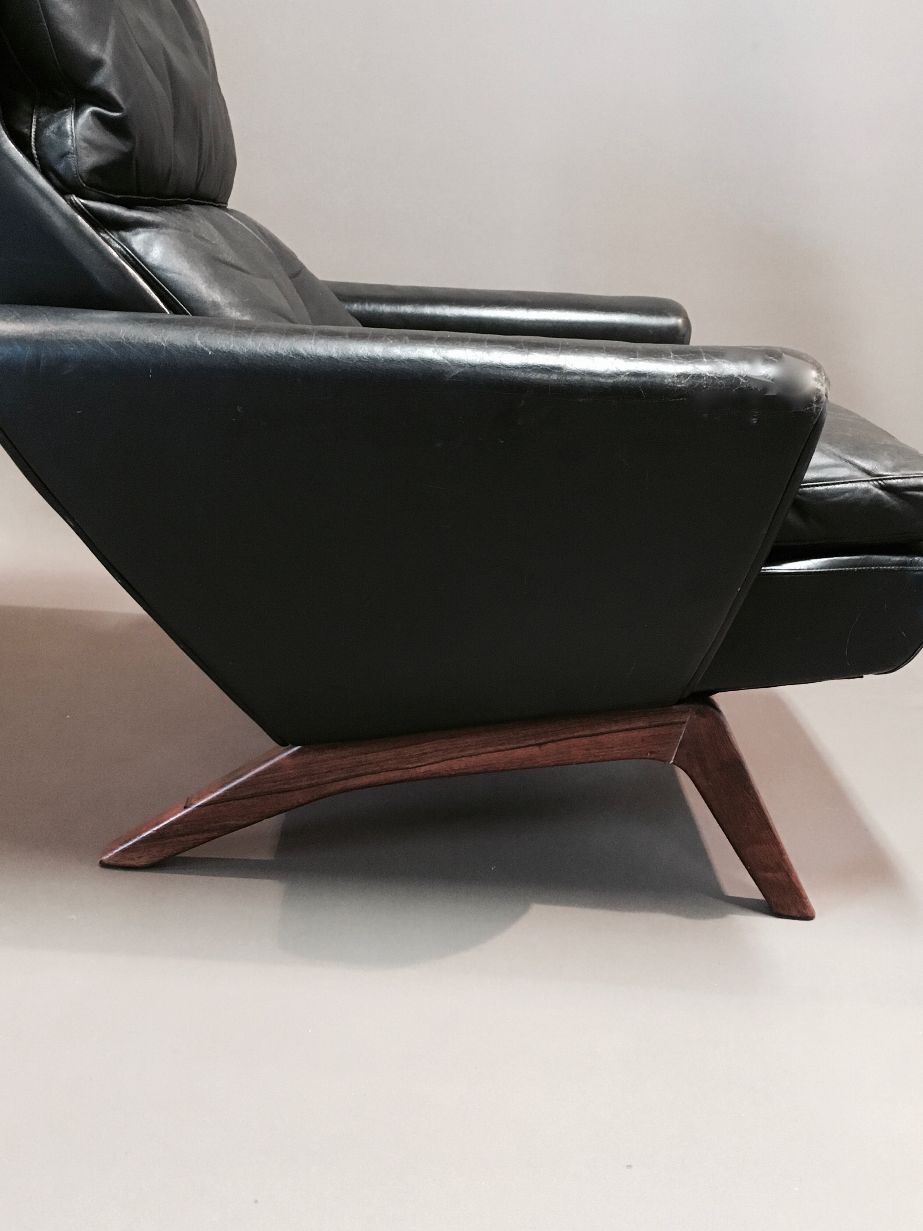 Rosewood armchair and black leather scandinavian 1950