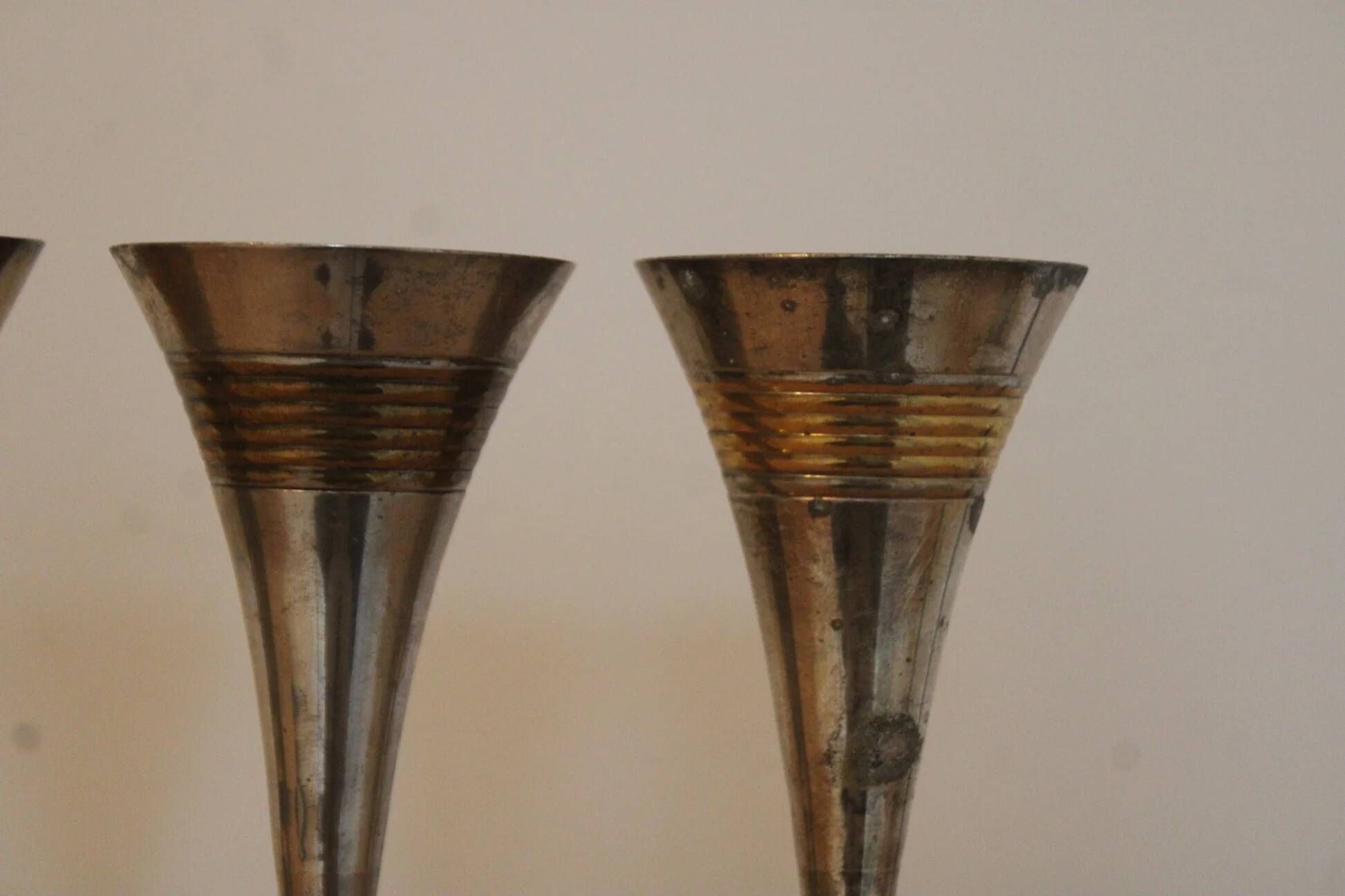 Set of 3 vintage silver-plated and gold footed cups.