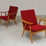 Pair of red Boomerang armchairs by Antonin Suman for Ton Bystrice Thonet