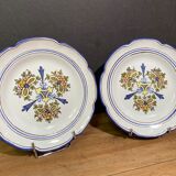 Pair of Nevers earthenware plates signed Georges