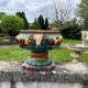 Large neoclassical majolica jardinière with ram's heads.