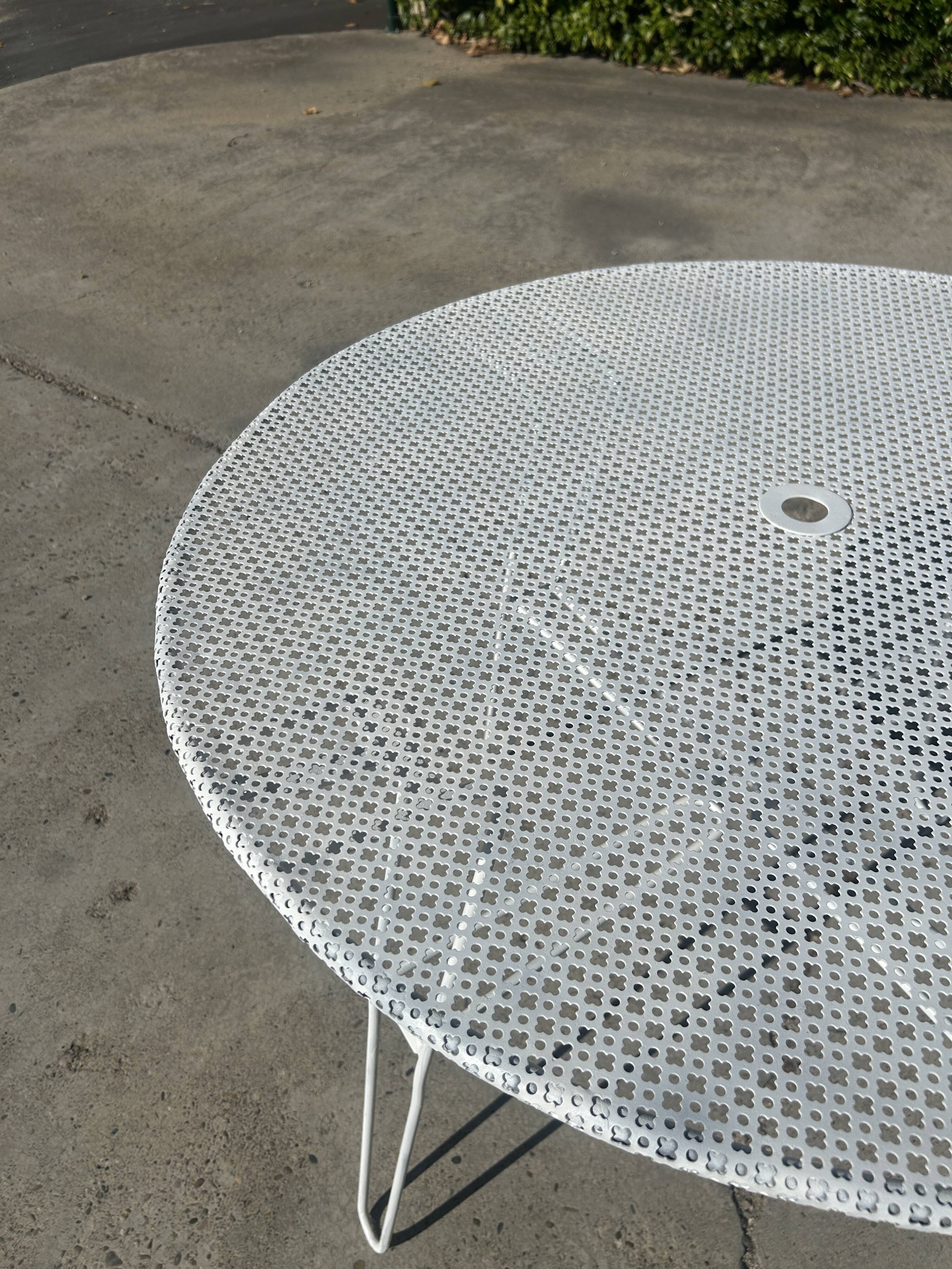 Garden table attributed to Mathieu Mategot from the 1950s.