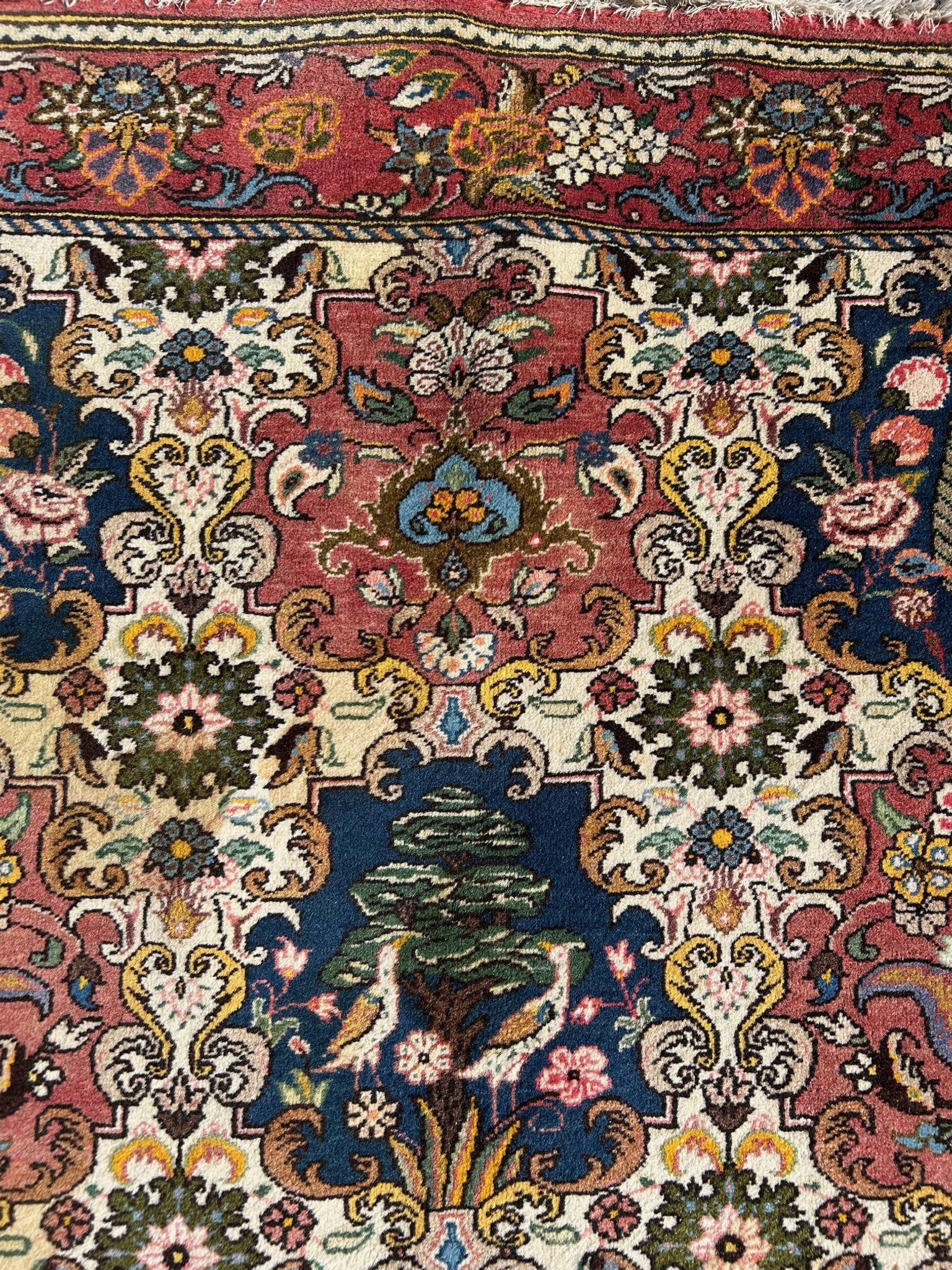 tapis d'orient à décor d'oiseaux 150/205cm