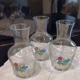 3 glass carafes, vintage. Very pretty floral pattern.