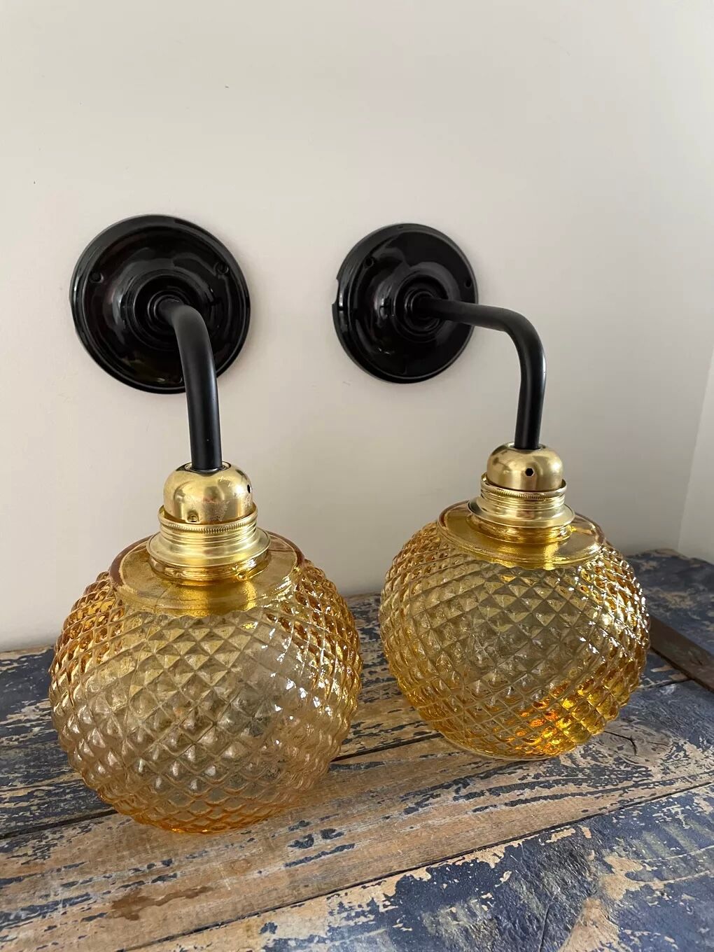 Pair of vintage sconces in electrified golden glass to nine