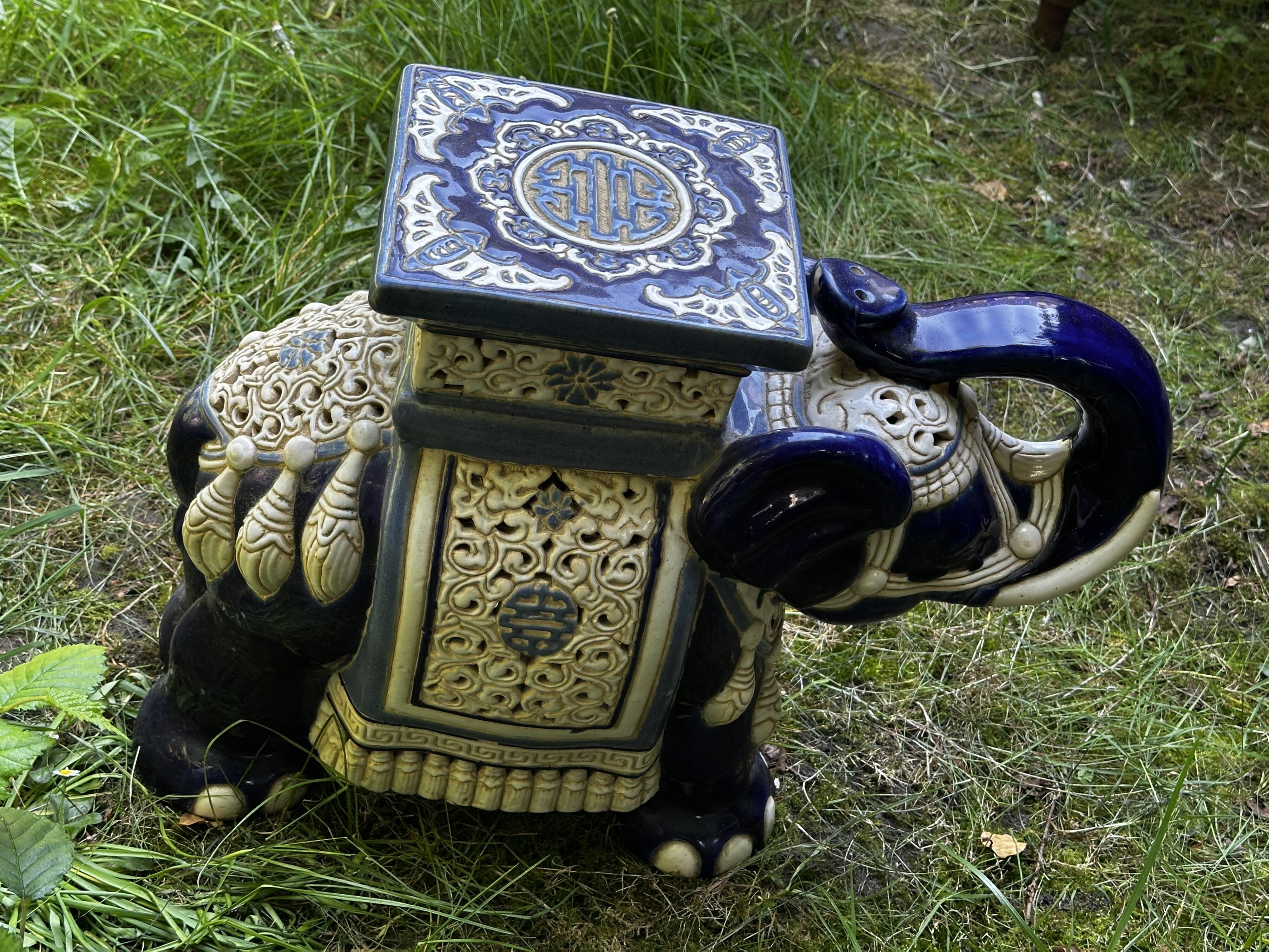 Elephant stool in glazed ceramic in cobalt blue and ivory colors