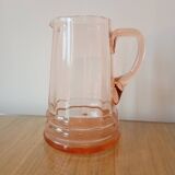 Vintage pink glass water carafe from the 1970s.