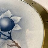 Art Nouveau plate in earthenware with a brass frame