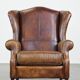 Fauteuil à oreilles en cuir de mouton