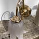Flower wall lamp in glass and gold metal