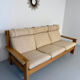 Three-seater canapé in solid oak with Scandinavian design fabric from the 1970s.