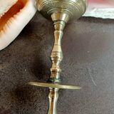 Oriental candlestick in gilded bronze