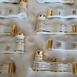 12 Limoges art porcelain knife rests in their case