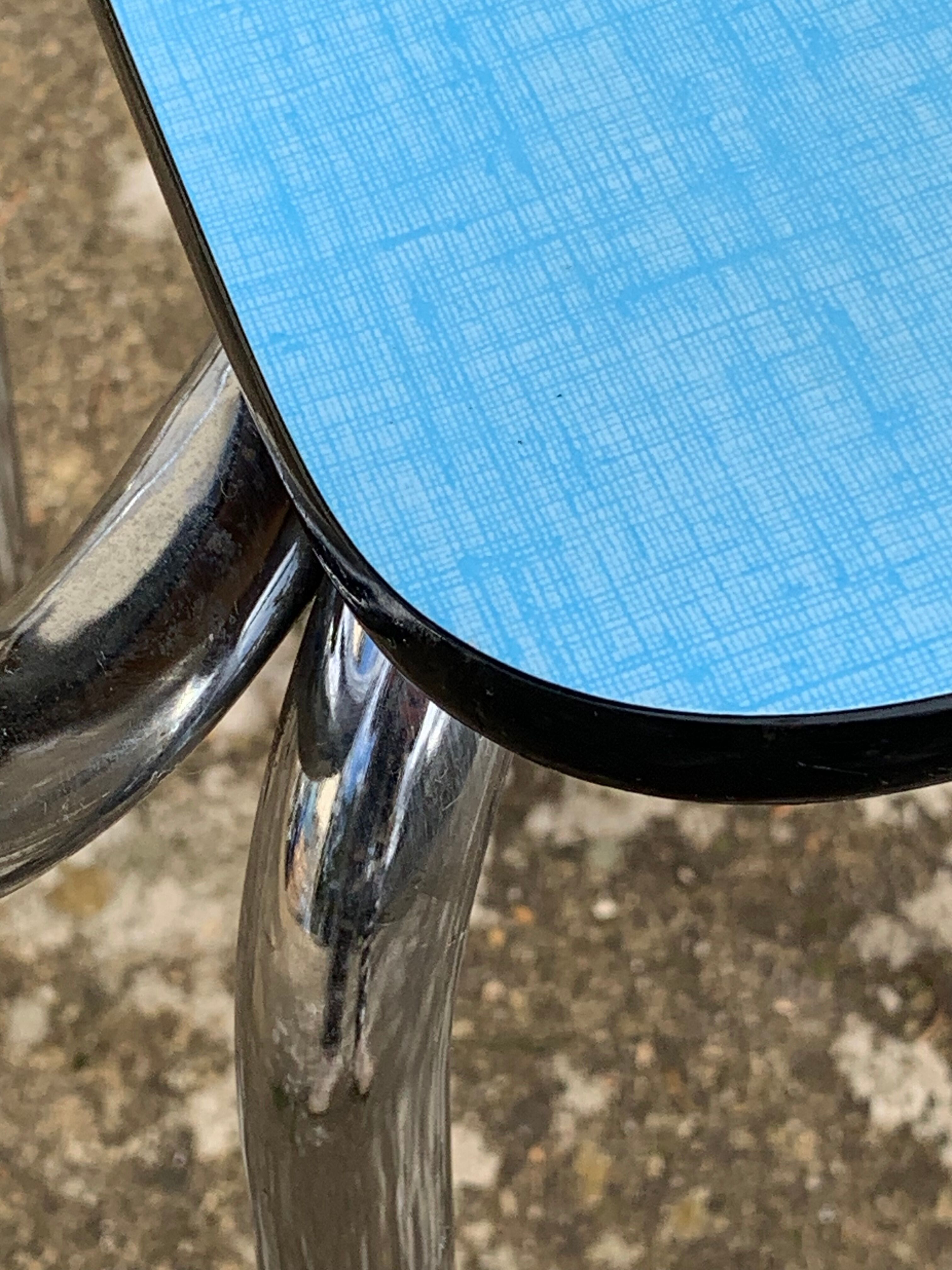 Mismatched formica chairs and stool 1960