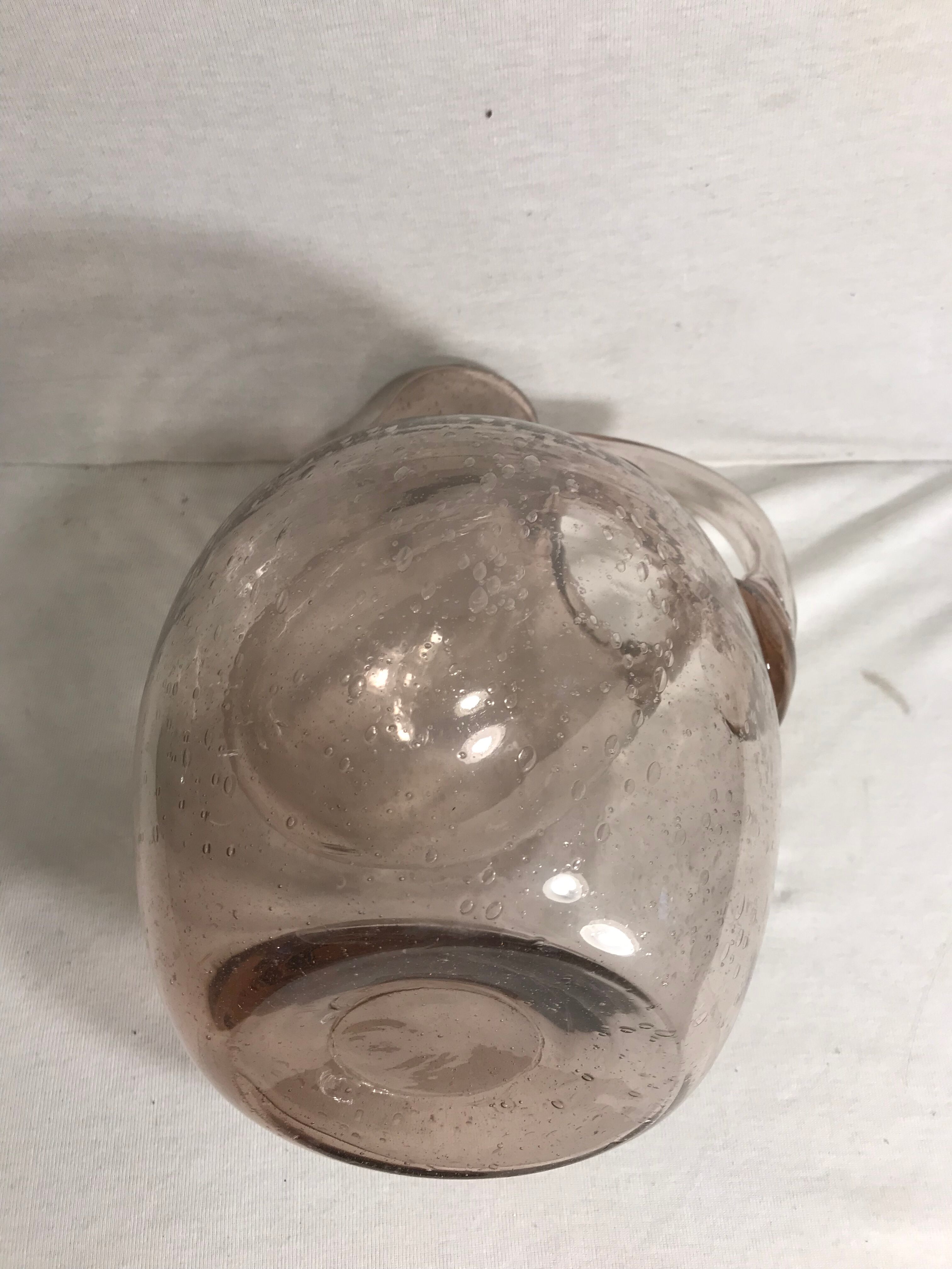 Bubble blown glass jug