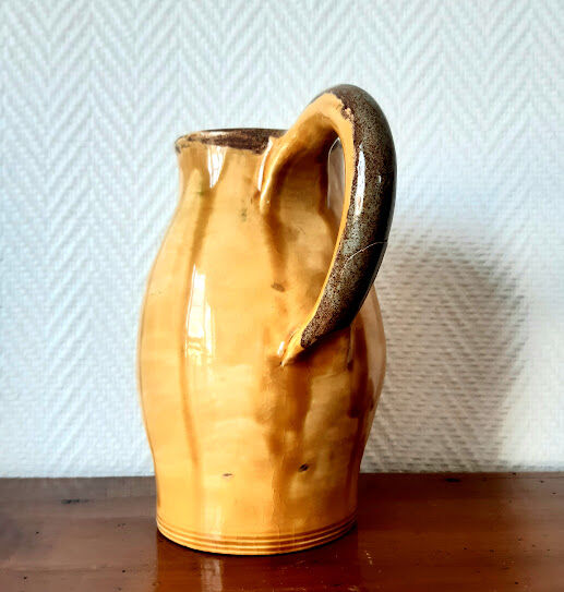 Set of art nouveau ceramic pitchers