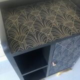 Black and gold Art Deco bedside table
