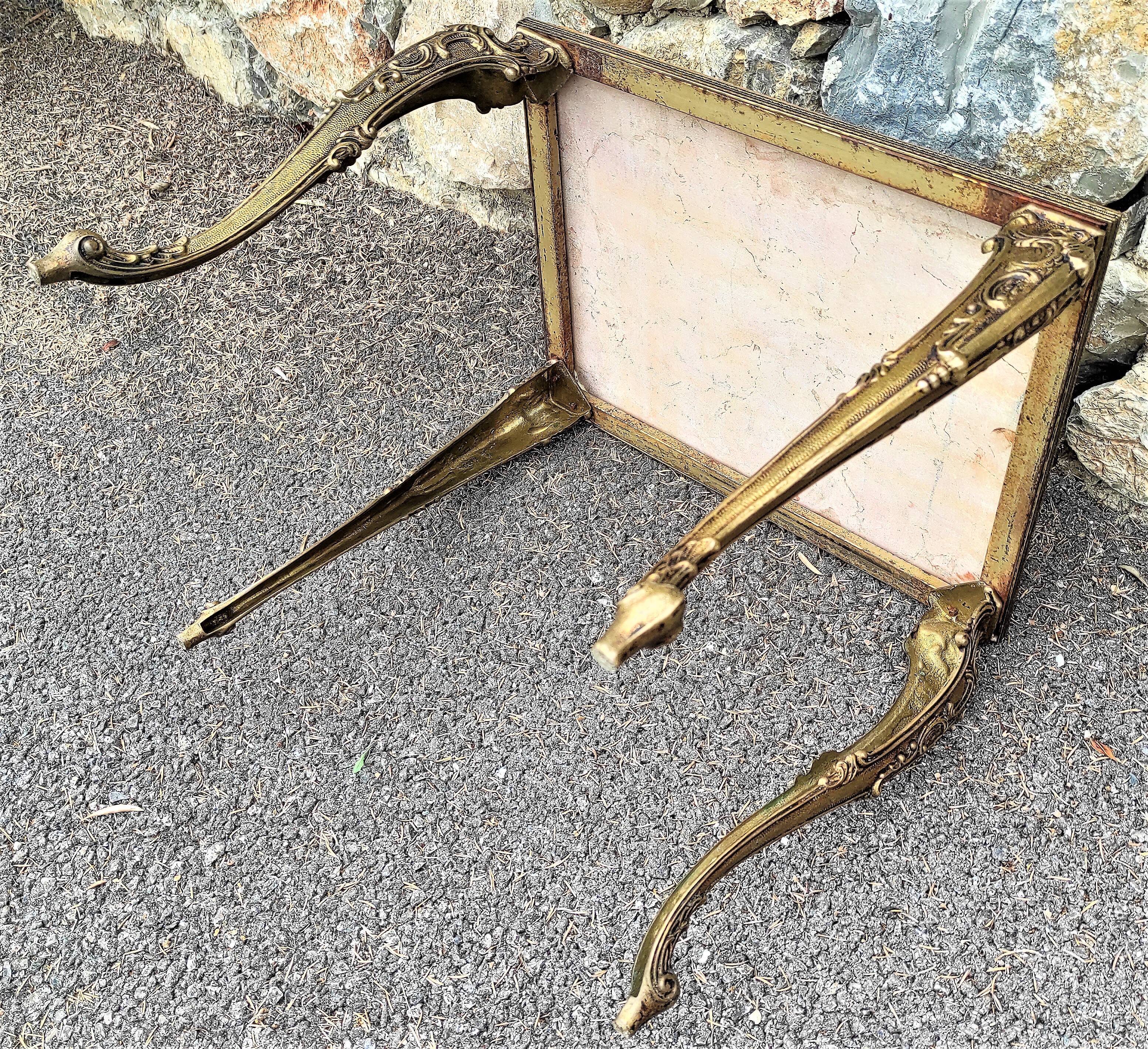 Coffee table with curved legs and pink marble top