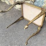 Coffee table with curved legs and pink marble top