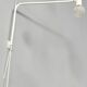 Minimalist metal wall light in the style of Jean Prouvé, circa 1950.