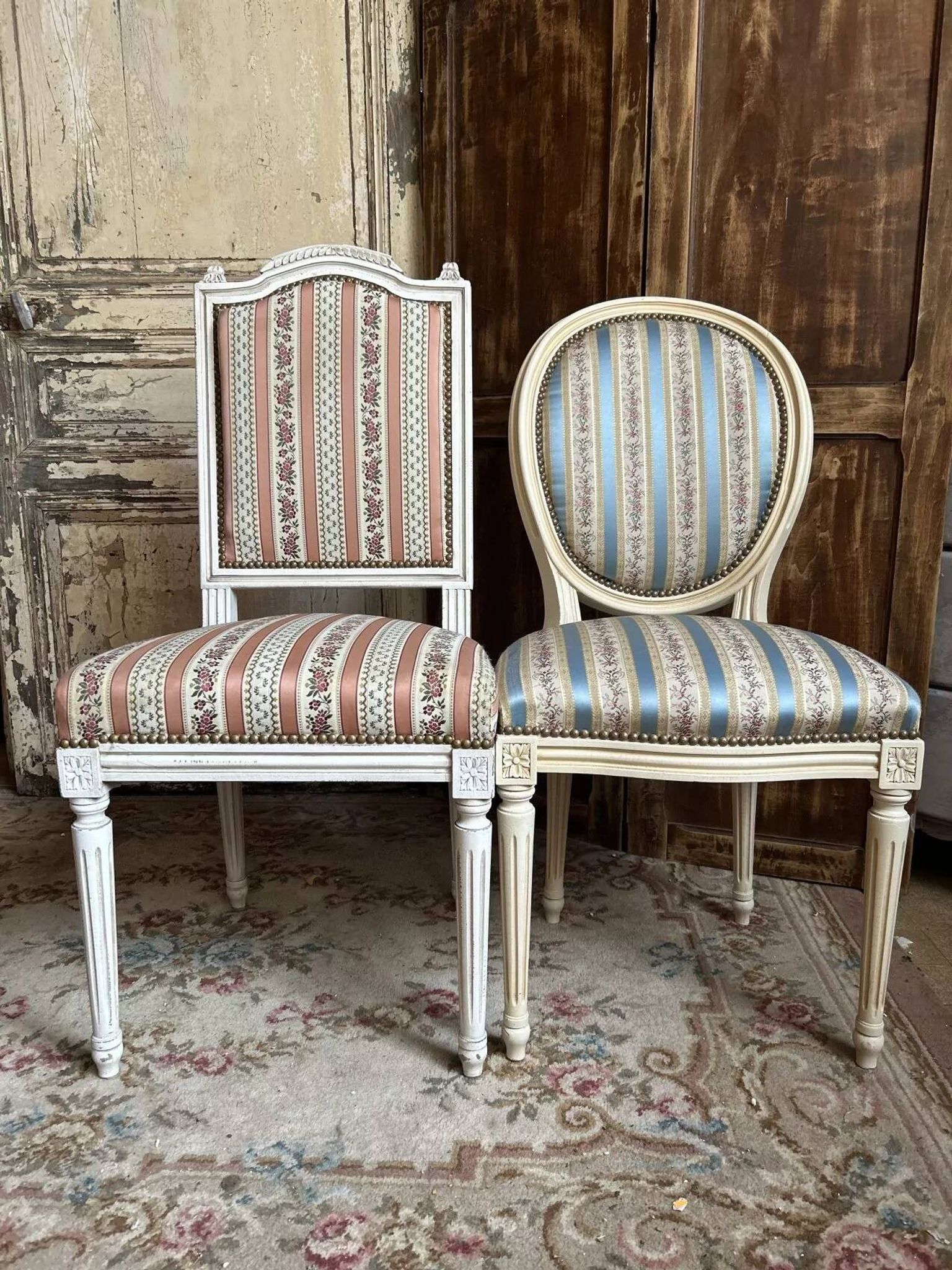Pair of Louis XVI style chairs in painted wood and satin, classic elegance.