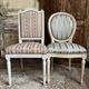 Pair of Louis XVI style chairs in painted wood and satin, classic elegance.