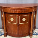 Empire style sideboard. Mahogany. Gilded bronze decoration.