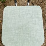 Green-blue Formica chair