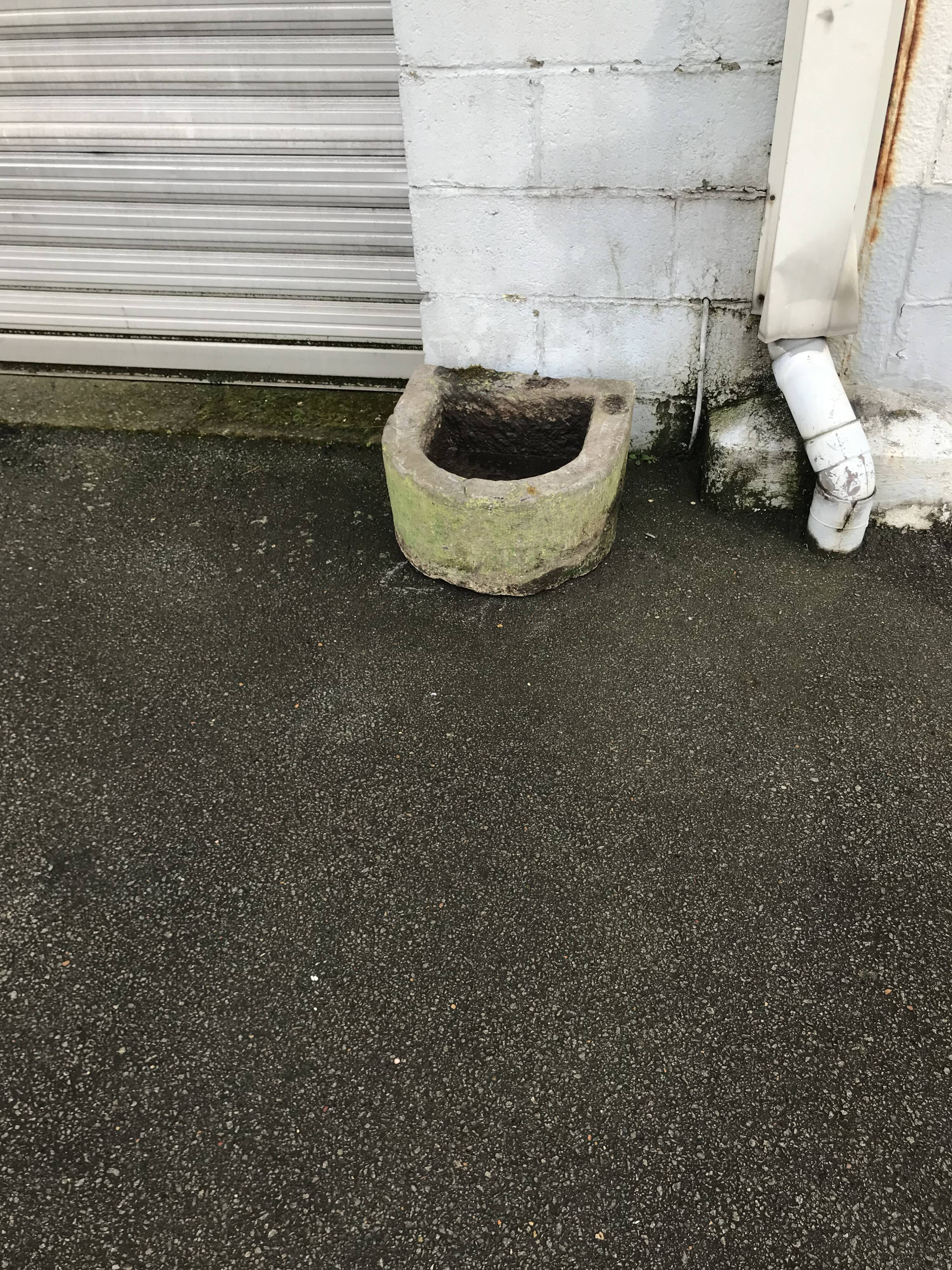 Old blue stone bin