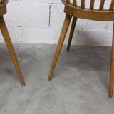 Pair of Baumann Menuet chairs, Honey patina, White vinyl seats