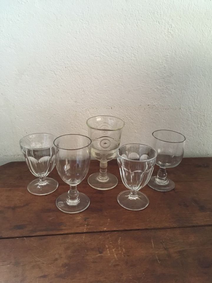 Together five mismatched stemware