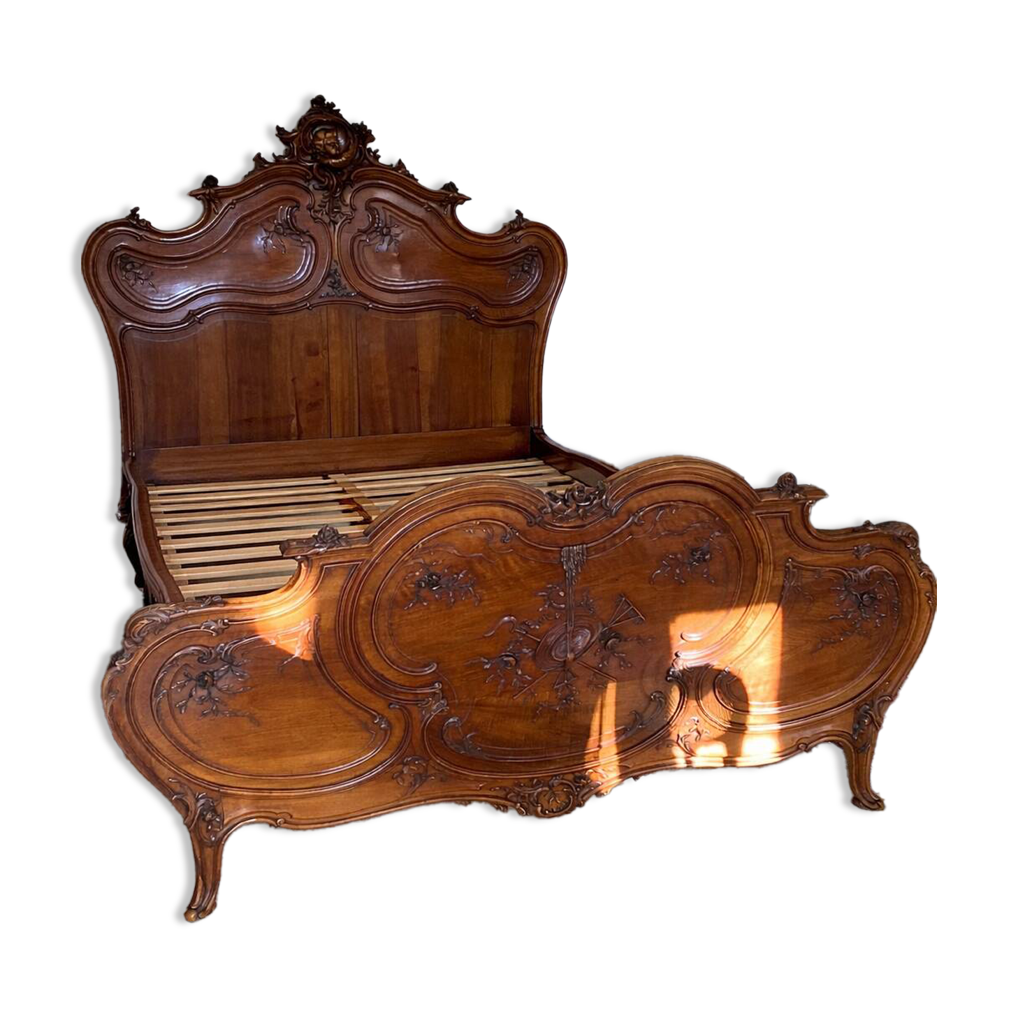 Superb Louis XV Provençal bed in richly carved and engraved walnut.