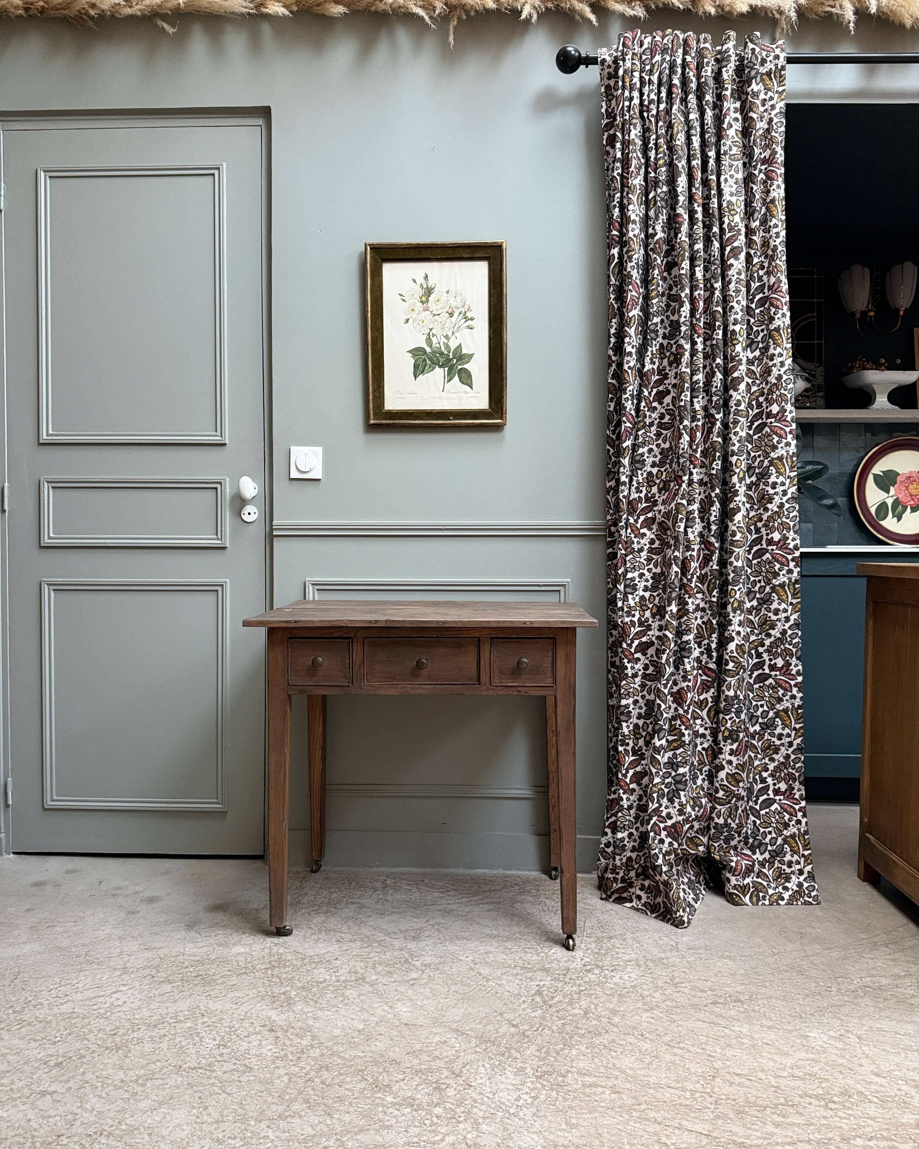 Small antique desk on wheels
