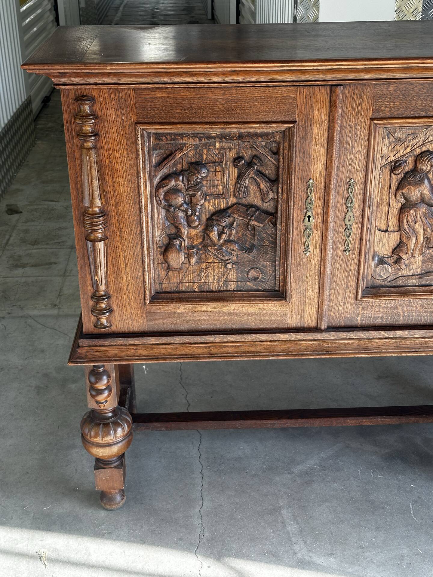 Large carved oak buffet in neo-Renaissance style, mid-20th century.